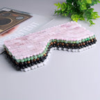 Masque pour les yeux fatigués en pierre quartz rose.