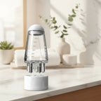 Applicateur d’huile capillaire pour cuir chevelu avec effet massant.